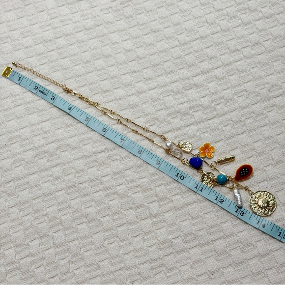NEW Gold Tone Charm Necklace with Sun Medallion, Pearl & Turquoise Blue Accents - Picture 8 of 9